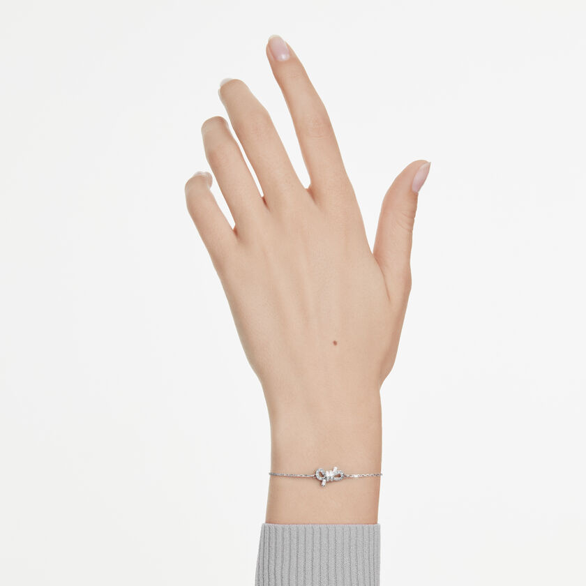 swarovski سوار lifelong، أحجار كريستال صغيرة متراصة، شكل أنشوطة، لون أبيض، طلاء روديوم