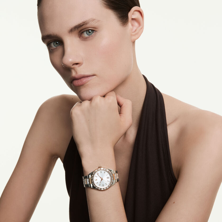 swarovski ساعة بتقويم matrix، صناعة سويسرية، سوار معدني، لون ذهبي وردي، لمسة نهائية من معادن مختلطة