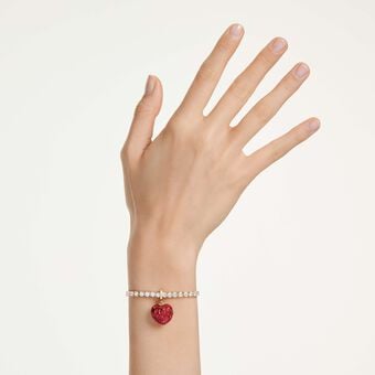 swarovski حلية idyllia، قطع مستدير، شكل قلب، لون أحمر، طلاء باللون الذهبي