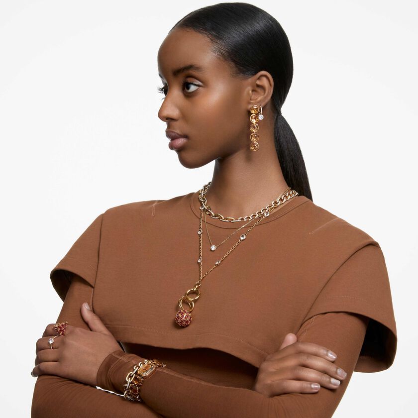 swarovski خاتم curiosa كوكتيل، دائري، لون أحمر، طلاء بلون ذهبي